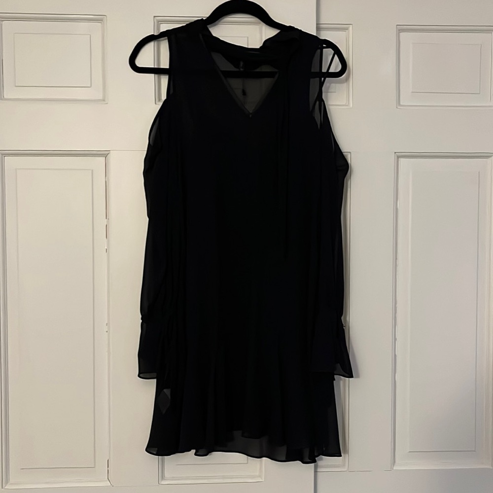 Bcbg black dress with tue detail and flounce bottom